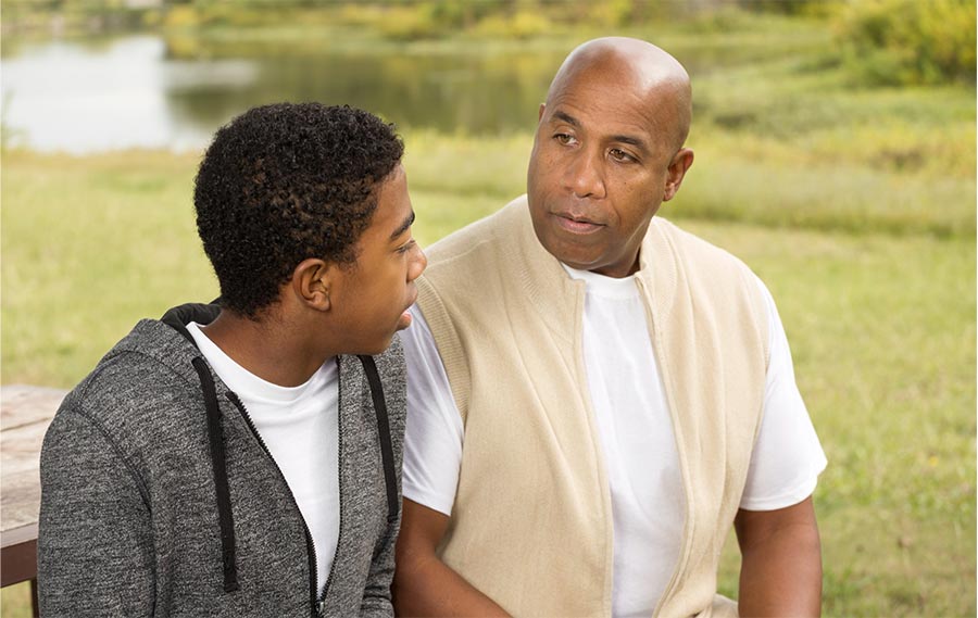 Father and son talking